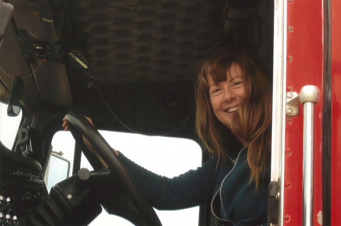 My short but thrilling trucking career (note the wild hair – we had the windows open so I could enjoy the sound of the engine).